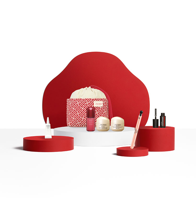 6 products + pouch on red camelia background